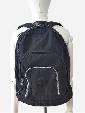 Kipling black Hal Expandable backpack with silver accents.